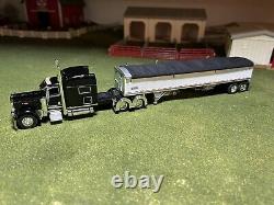 1/64 Black DCP 389 Peterbilt with 70 Sleeper & White Wilson Grain Trailer