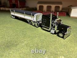 1/64 Black DCP 389 Peterbilt with 70 Sleeper & White Wilson Grain Trailer