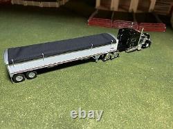 1/64 Black DCP 389 Peterbilt with 70 Sleeper & White Wilson Grain Trailer