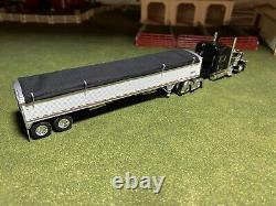 1/64 Black DCP 389 Peterbilt with 70 Sleeper & White Wilson Grain Trailer