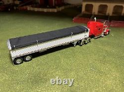 1/64 Red DCP 389 Peterbilt with 70 Sleeper & White Wilson Grain Trailer