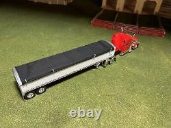 1/64 Red DCP 389 Peterbilt with 70 Sleeper & White Wilson Grain Trailer