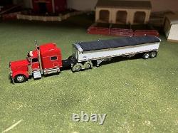 1/64 Red DCP 389 Peterbilt with 70 Sleeper & White Wilson Grain Trailer