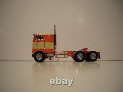Dcp 1/64 Orange And Tan Pete 352 With 86'' Sleeper Cab And Spread Axle Flatbed